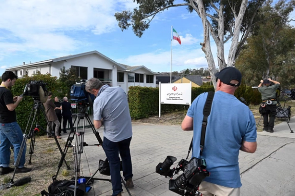 Members of the media wait outside the Embassy of the Islamic Republic of Iran in Canberra, Australia, August 26, 2025.