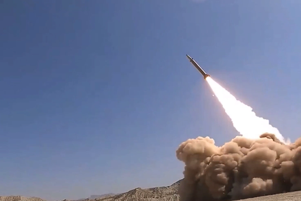 Iran threatens to hit US bases after unveiling new ballistic missile