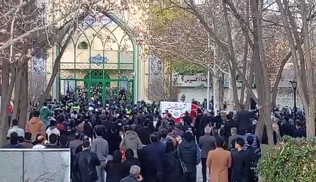 The people gathering outside a mosque in Mashhad where a memorial service was held for Iranian rights lawyer Khosrow Alikordi on December 12, 2025