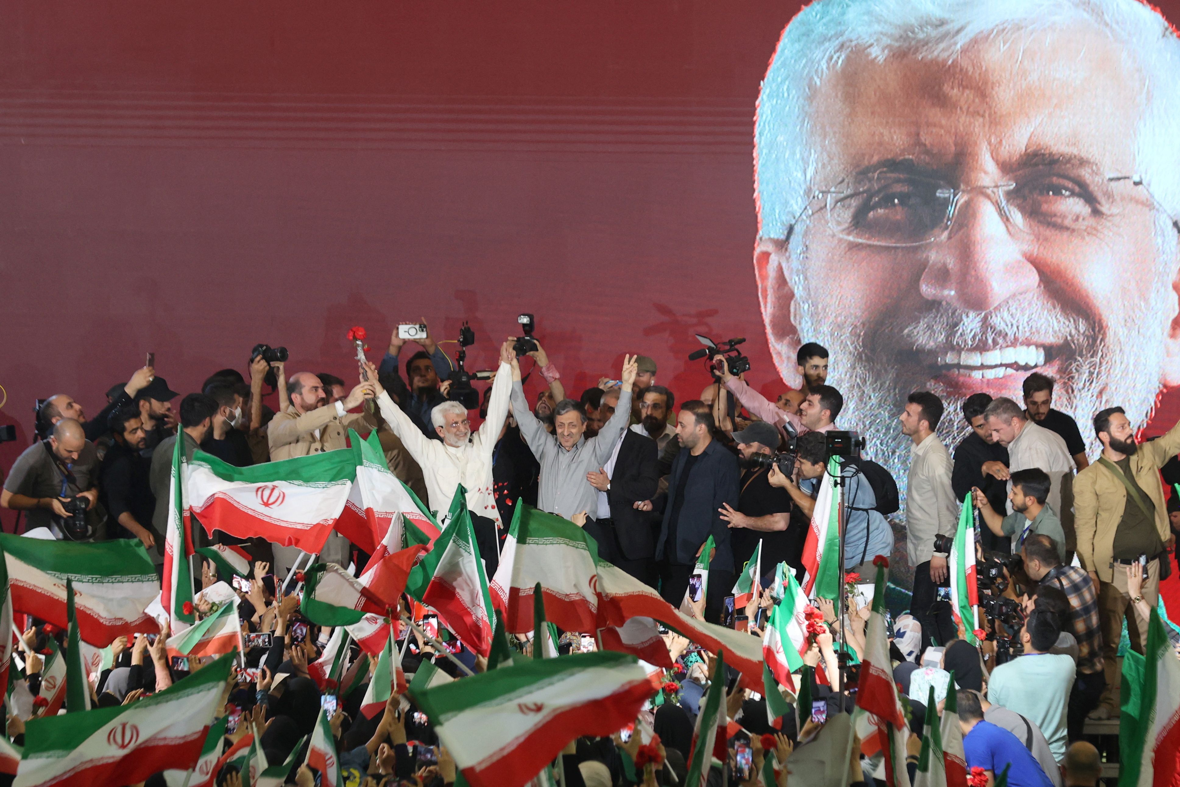  Saeed Jalili waves during a campaign event in Tehran, Iran, July 3, 2024.