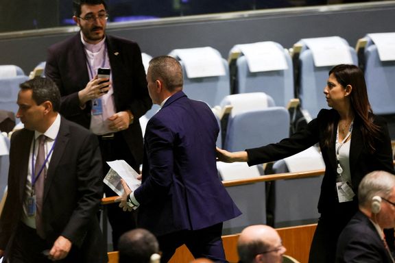 Israel's Ambassador to the United Nations Gilad Erdan is led out of the United Nations General Assembly hall by security officials on September 19, 2023.