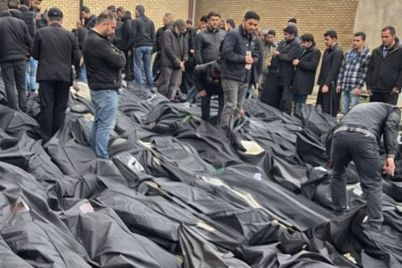 People search for loved ones among rows of bodybags in Tehran, Iran, January 2026