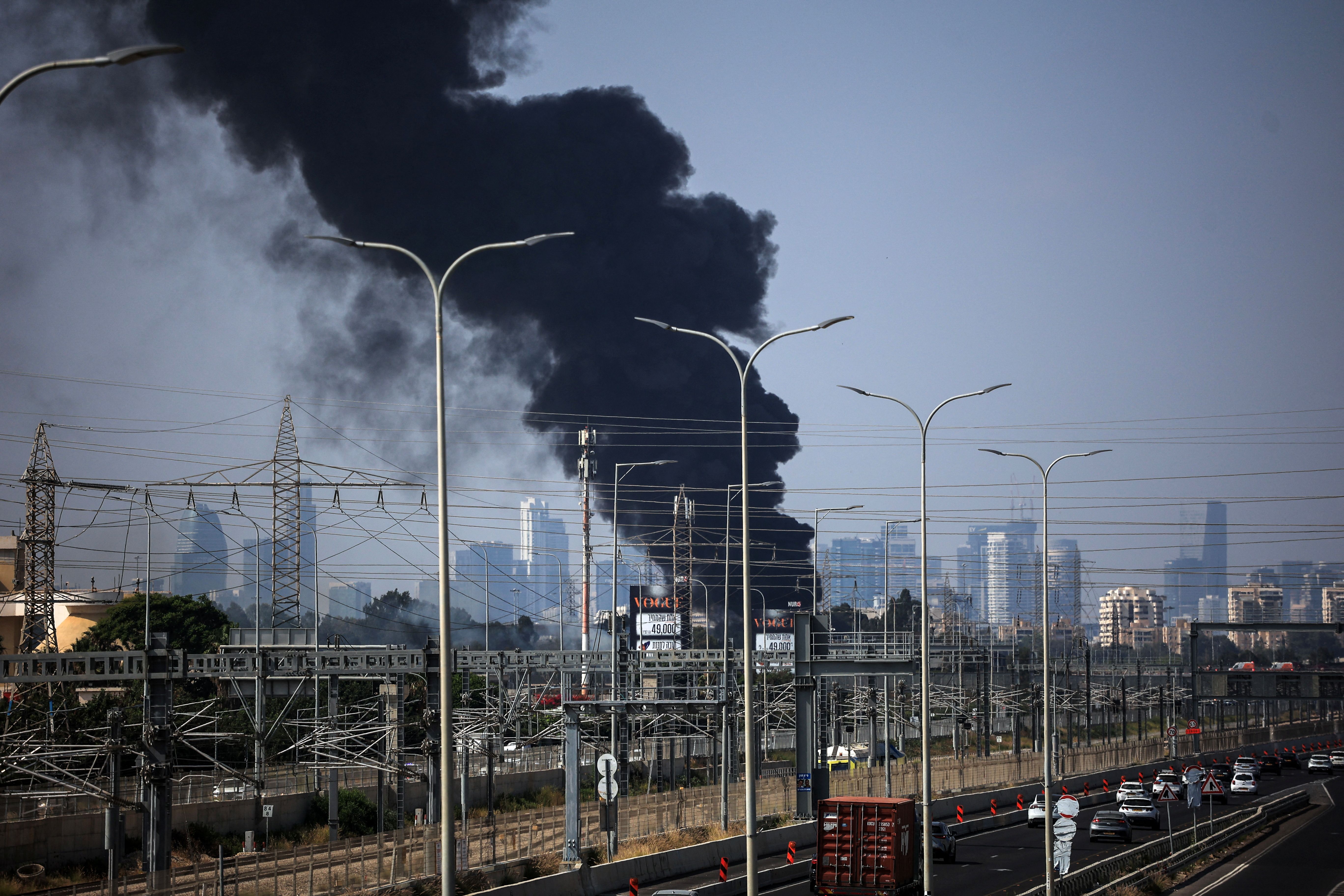 Smoke rises following a missile attack from Iran, in Herzliya, Israel, June 17, 2025.