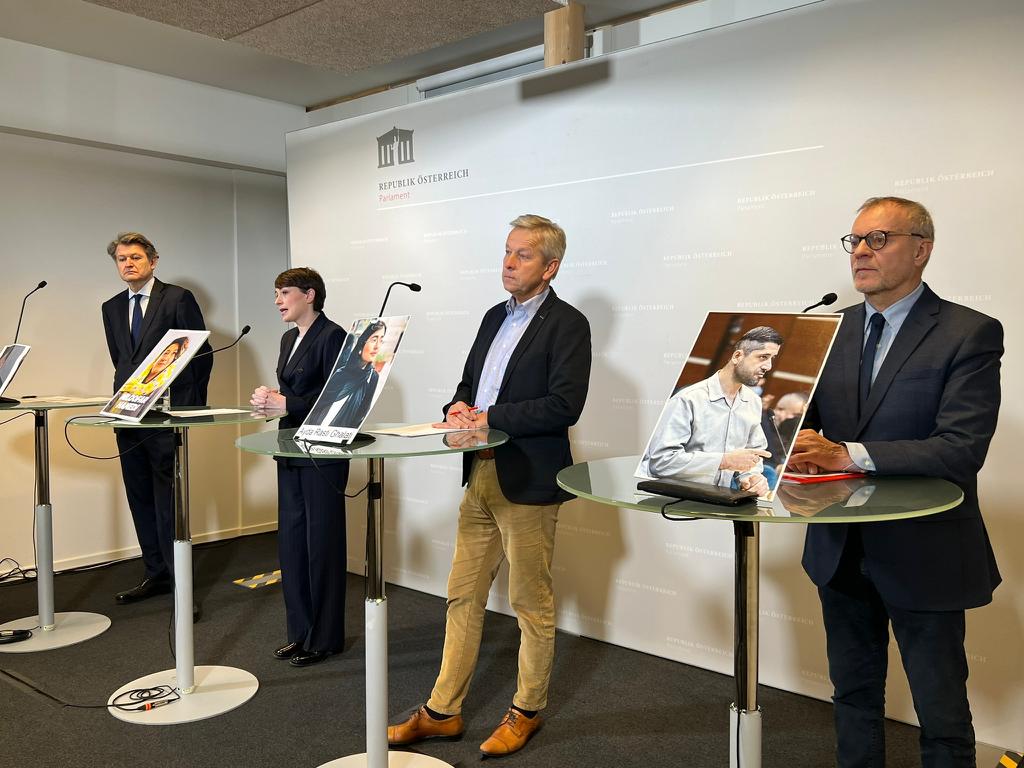 Members of the Austrian parliament holding photos of Iranian protesters in danger of execution  (December 2022)