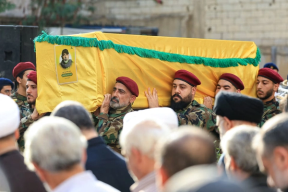 Pallbearers carry the coffin of Hezbollah's top military official, Haytham Ali Tabtabai, who was killed by an Israeli airstrike on Sunday, despite a U.S.-brokered truce a year ago, during his funeral in Beirut's southern suburbs, Lebanon November 24, 2025.