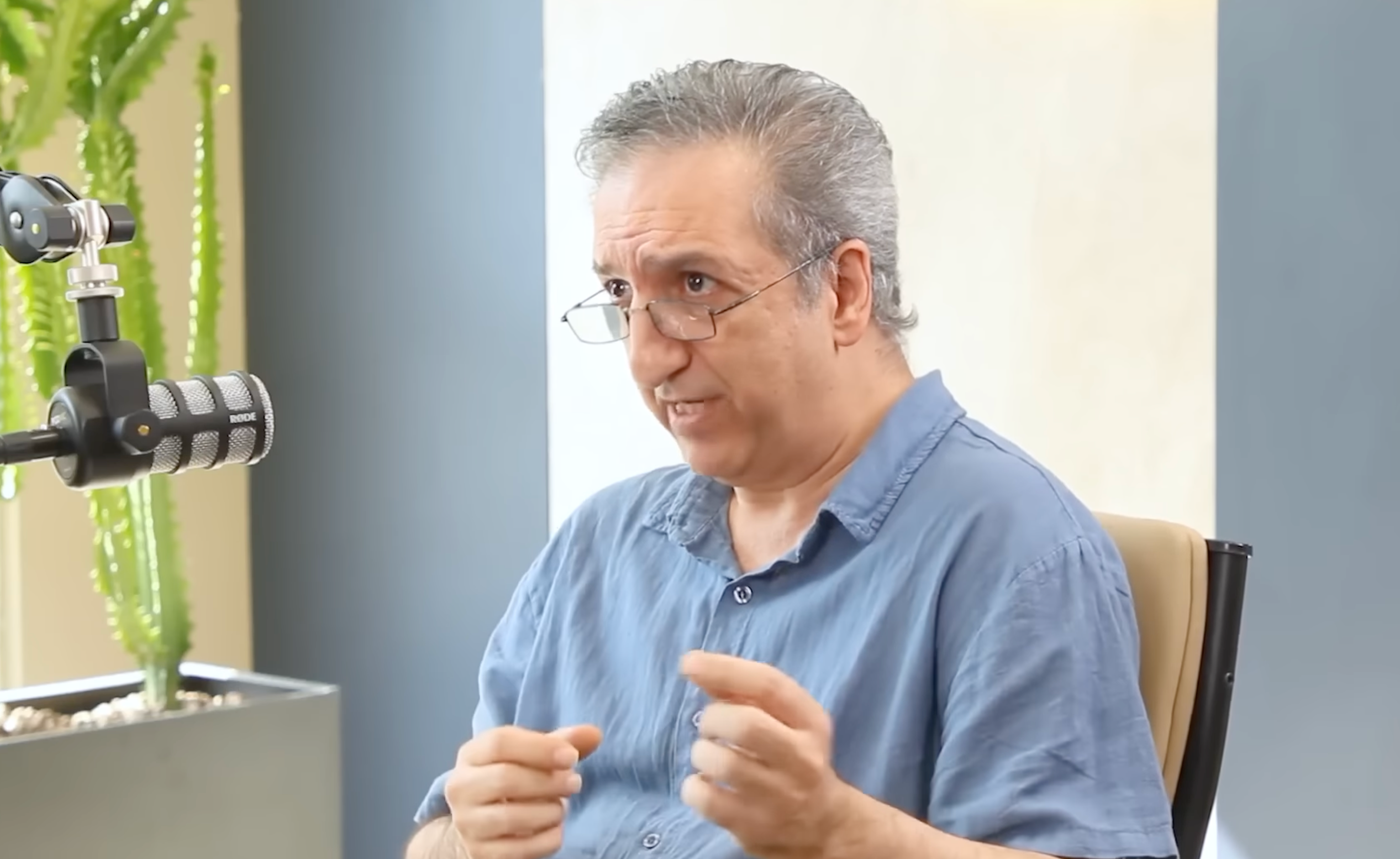 Detained economist had linked rise of Tehran ultra-hardliners to Khamenei