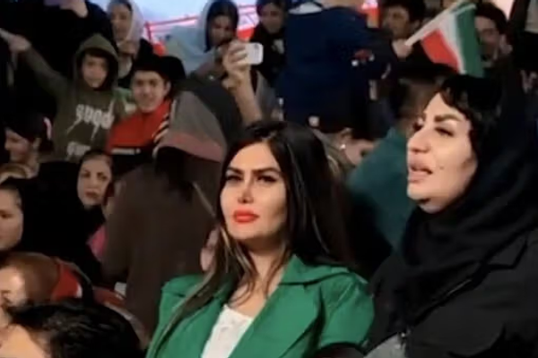 Iran lets unveiled women join once-taboo nationalist state event