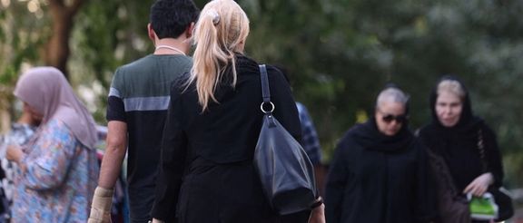 An Iranian woman without the mandatory hijab in Tehran