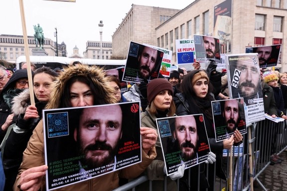 People protest against the detention of Belgian aid worker Olivier Vandecasteele in Iran.
