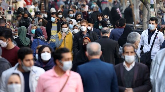 People in a crowded Tehran street in November 2021