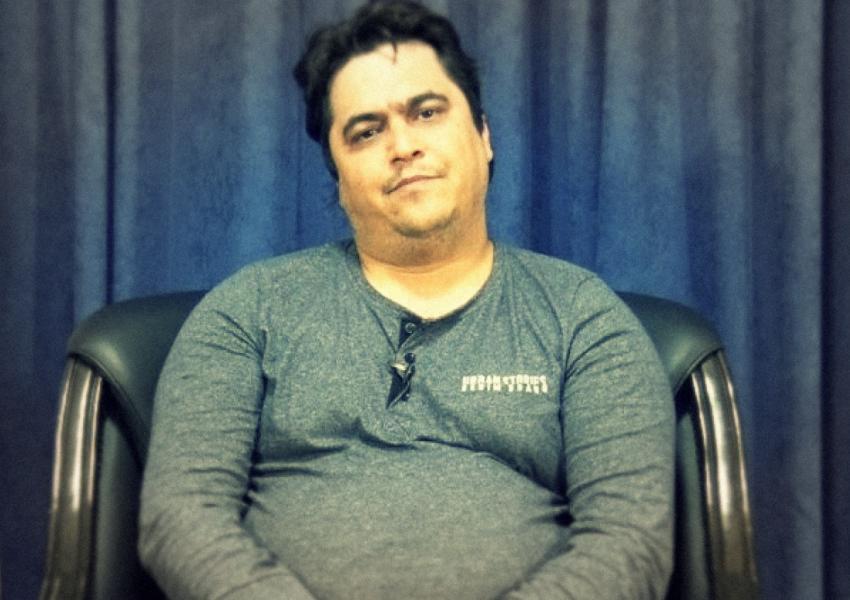 Father Of Hanged Journalist Accuses Iran's Rouhani Of Direct Role