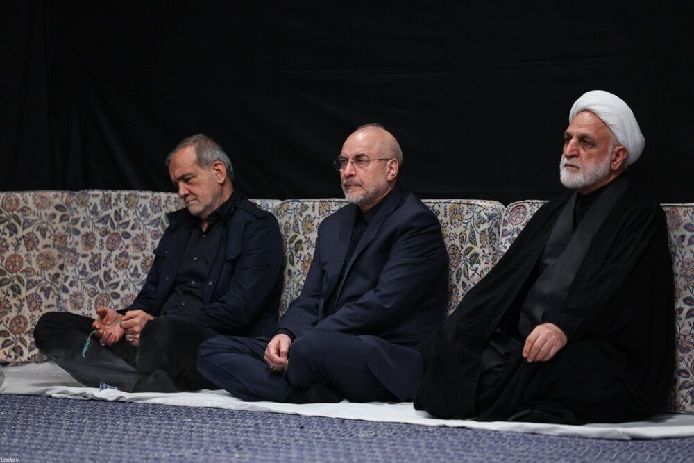 Iran's President Masoud Pezeshkian (left), Parliament Speaker M.B. Ghalibaf, and Judiciary Chief Mohseni-Ejei attend a funeral ceremony for slain Supreme Leader Ali Khamenei in July 2026.
