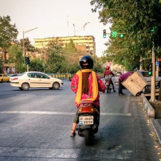An Iranian woman riding a motorcycle in Tehran (undated)