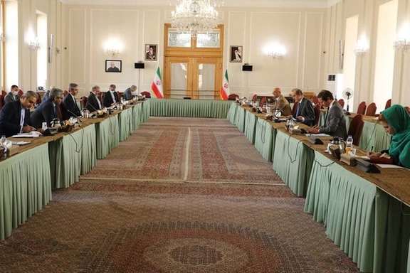 Photo from Iran's foreign ministry showing talks with EU diplomat Enrique Mora. October 14, 2021