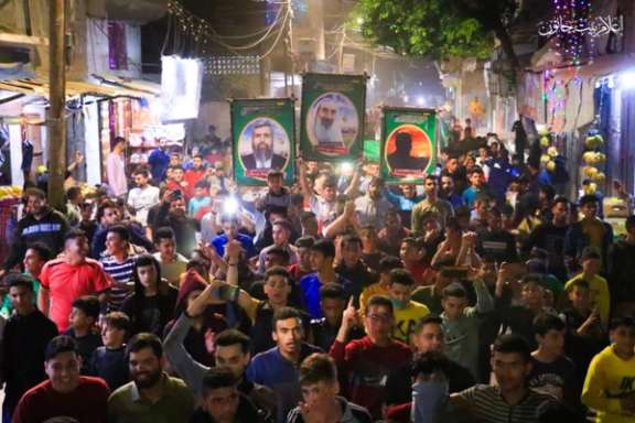 Palestinian Hamas supporters cheering the terrorist attack in Israel. April 7, 2022