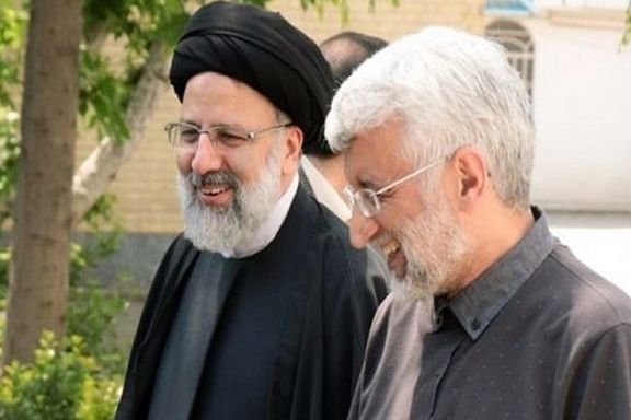 Saeed Jalili, a ultra-hardliner politician and behind-the -scenes leader of Paydari, with President Ebrahim Raisi in 2021