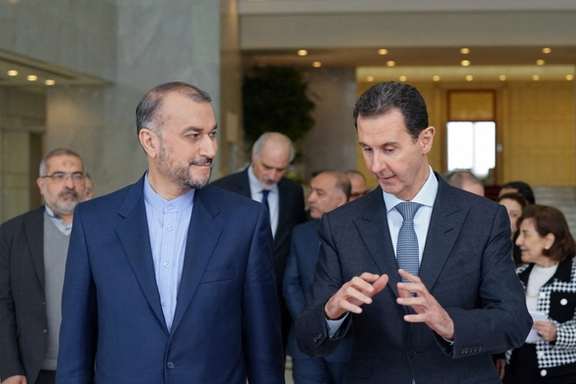 Iran's foreign minister Amir-Abdollahian (L) with Syrian President Bashar al-Assad. March 23, 2022