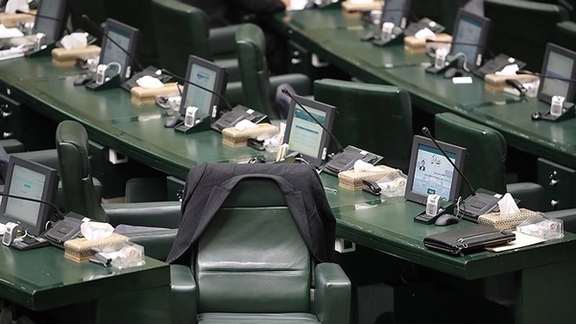 An empty seat during a session of the Iranian parliament. February 20, 2023