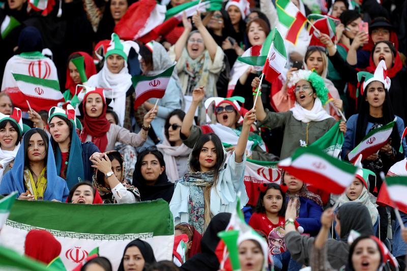 Iranian women attend Iran's World Cup Asian qualifier against Cambodia at the Azadi stadium in Tehran, Iran October 10, 2019.