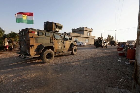 Iraqi forces and Kurdish Peshmerga fighters take part in an intensive security deployment after Islamic State militants took it over the previous day in Luhaiban village in Kirkuk, Iraq December 6, 2021.