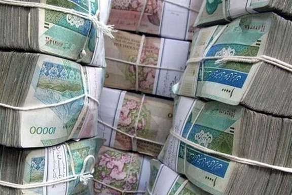 Pile of of depreciating Iranian currency, which is hard for people to carry around.