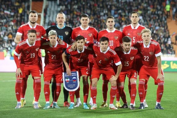 Russia players pose for a team photo before the match against Iran at Tehran’s Azadi Stadium on March 23, 2023.