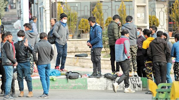File photo of group of day laborers in Iran