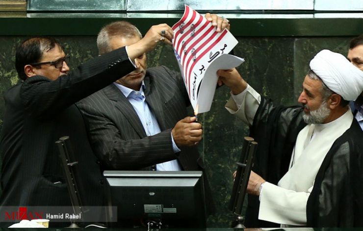 A group of Iranian lawmakers burning a copy of the JCPOA  (undated)