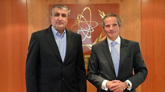 Iran's nuclear chief Mohammad Eslami (L) and IAEA's Rafael Grossi in Tehran on March 3, 2023