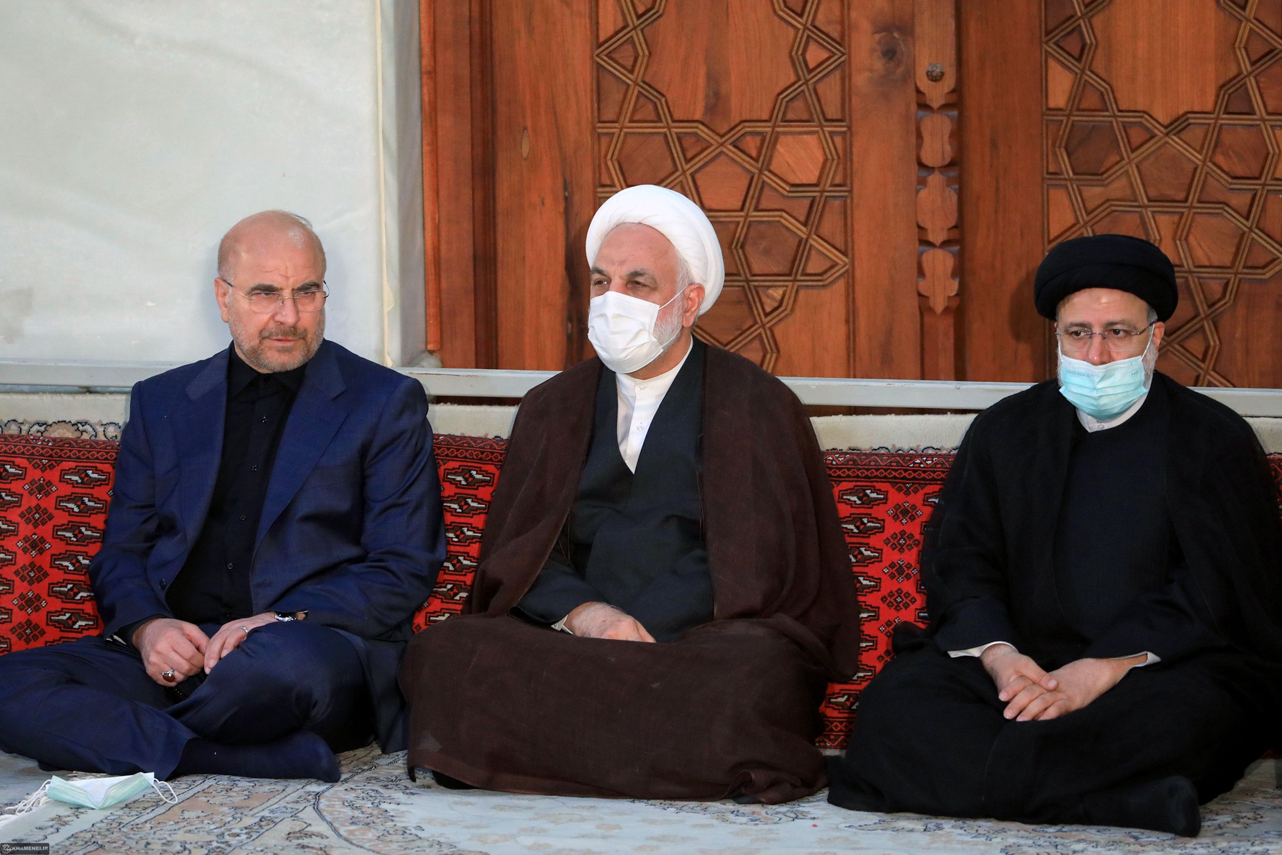 Iran’s Parliament Speaker Mohammad-Bagher Ghalibaf (left), Chief Justice Gholam-Hossein Mohseni-Ejei (center) and President Ebrahim Raisi during a ceremony to mark 34th death anniversary of the Islamic Republic’s founder Ruhollah Khomeini at his mausoleum near Tehran on June 4, 2023  