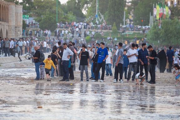Residents gather along the Zayandeh Roud in Isfahan to celebrate the return of water to the river, June 3, 2026