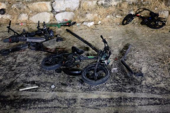 Damaged bikes are pictured after rockets were launched across Lebanon's border with Israel which, according to Israel's ambulance services, people were killed, at a soccer pitch in Majdal Shams, a Druze village in the Israeli-occupied Golan Heights, July 27, 2024.