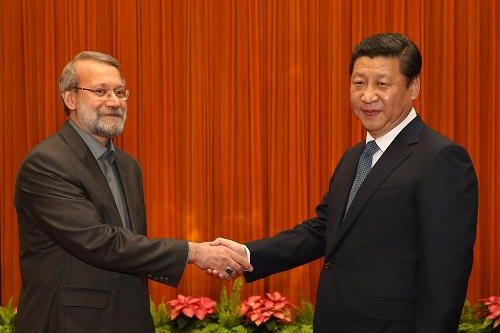 Former parliament speaker Ali Larijani with China's president. FILE PHOTO