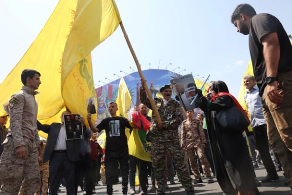 People attend an anti-Israeli protest following the Israeli strikes on Iran, in Tehran, Iran, June 13, 2025.