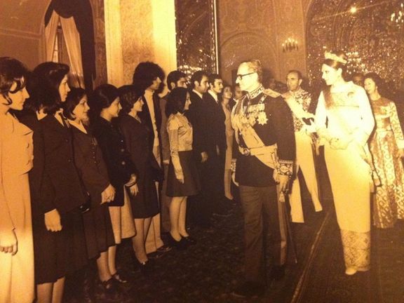 Photo of Itai's mother Diana receiving an award from the late Shah for her academic achievements.