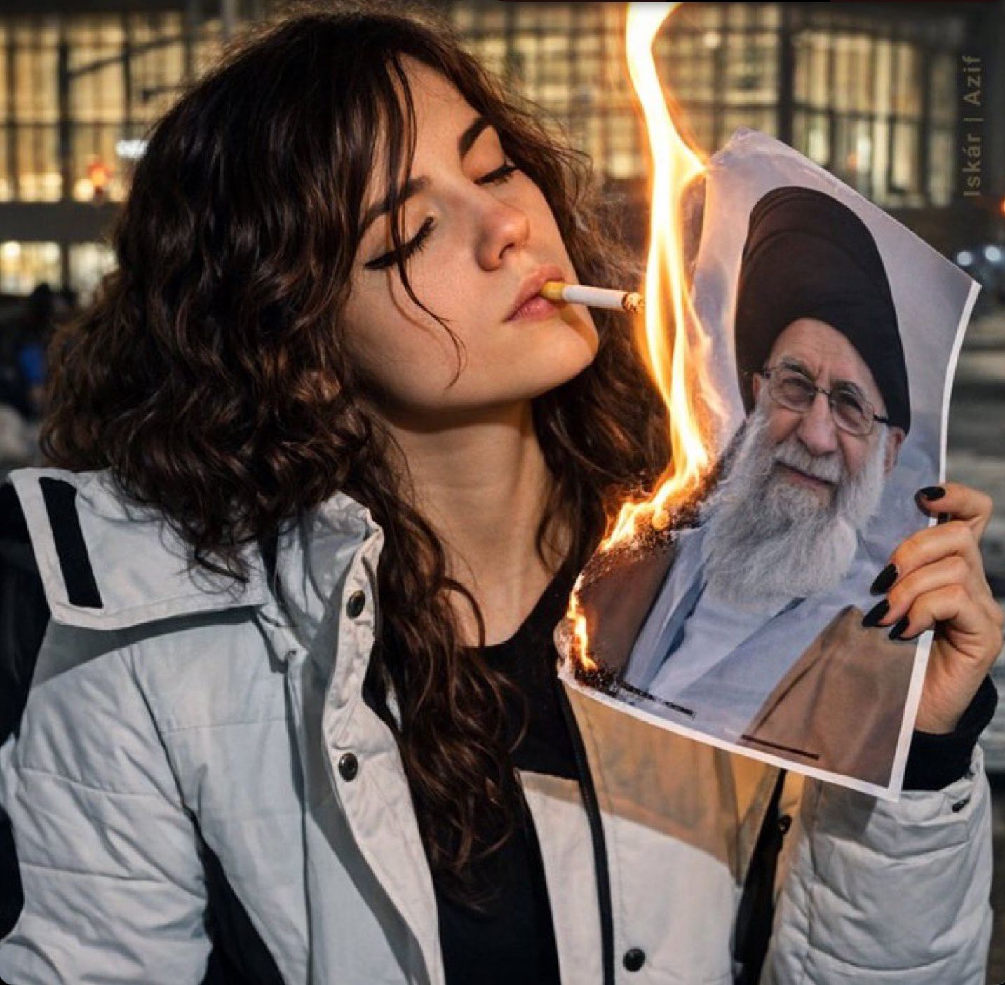 Lighting cigarette with burning Khamenei portrait becomes protest symbol