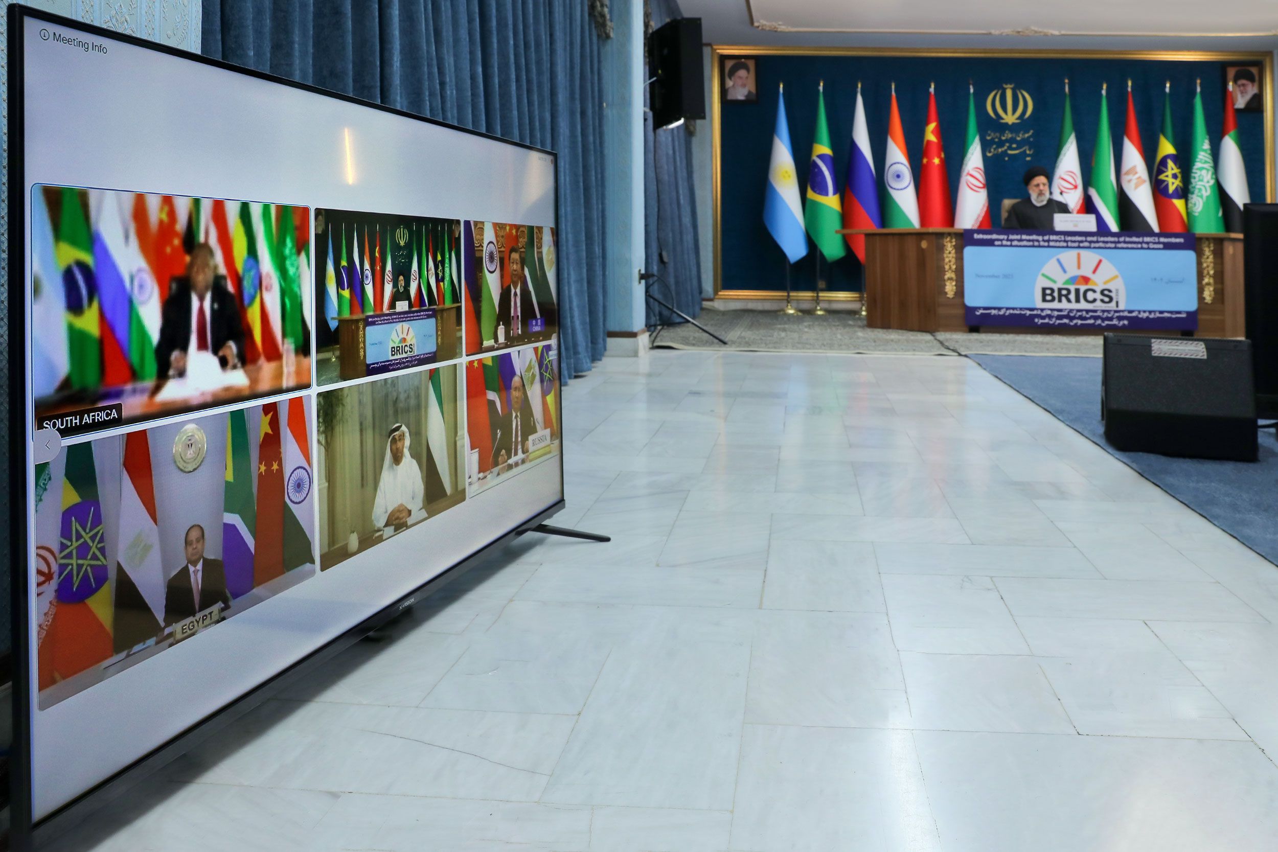 Iranian President Ebrahim Raisi (right) during a virtual meeting with heads of states of BRICS countries, November 21, 2023