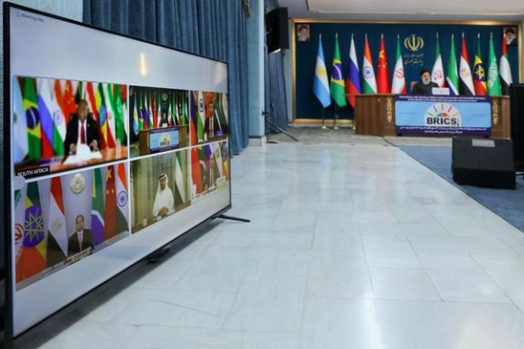 Iranian President Ebrahim Raisi (right) during a virtual meeting with heads of states of BRICS countries, November 21, 2023