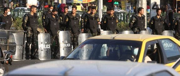 Iran's riot police forces stand in a street in Tehran, Iran, October 3, 2022.