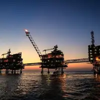 Iran state bank freezes national oil company accounts over debt