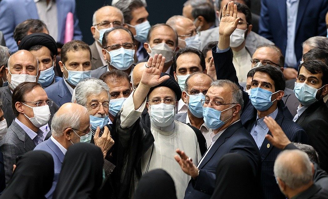President Raisi seen during his inauguration in the parliament with hardliner lawmakers in August 2021