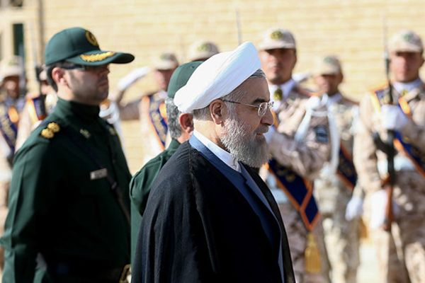 In reform plea, ex-president Rouhani urges military to quit economy