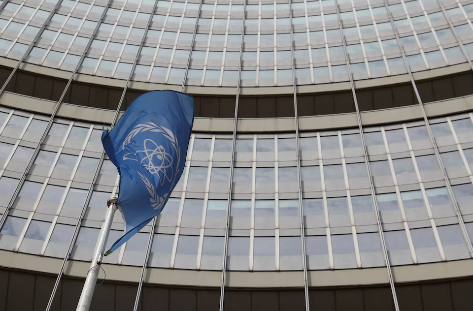 he flag of the International Atomic Energy Agency (IAEA) flutters in front of the agency's headquarters on the opening day of a quarterly meeting of its 35-nation Board of Governors in Vienna, Austria, June 3, 2024.