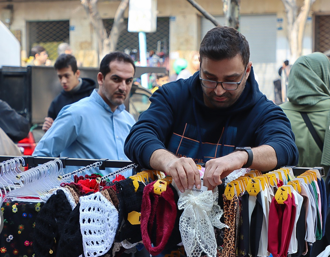 As war looms, Iran ensures military gets paid but people struggle