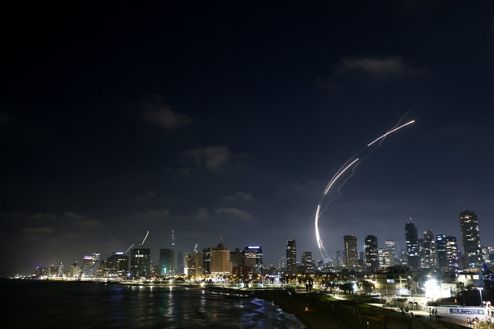 Iran unleashes hundreds of missiles on Israel, killing one