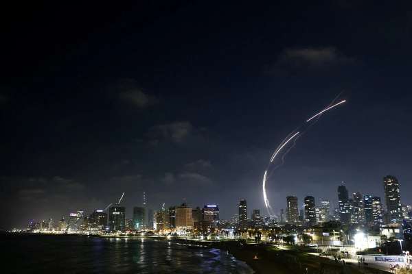 Iran unleashes hundreds of missiles on Israel, killing one