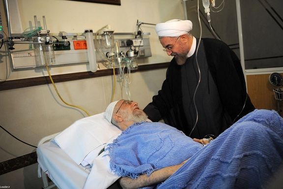 Former president Hassan Rouhani visiting Iran’s ruler Ali Khamenei in hospital after the surgery (September 2014)