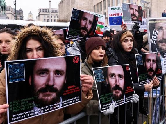People protest against the detention of Belgian aid worker Olivier Vandecasteele in Iran, Belgium, January 22, 2023.