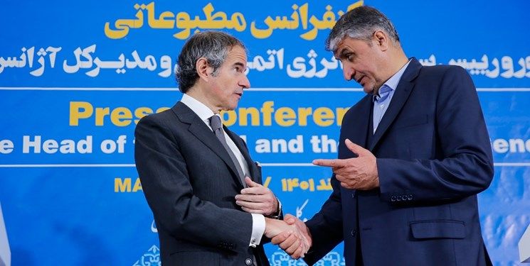 International Atomic Energy Agency Director General Rafael Mariano Grossi (left) and Mohammad Eslami, the head of the Atomic Energy Organization of Iran, during a press conference in Tehran in March 2023  