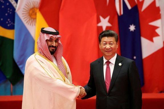 FILE PHOTO: Chinese President Xi Jinping with Saudi Arabia's Crown Prince Mohammed bin Salman during the G20 Summit in China September 4, 2016.